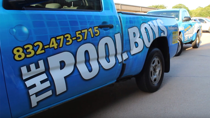 The Pool Boys maintenance trucks lined up for service in the morning